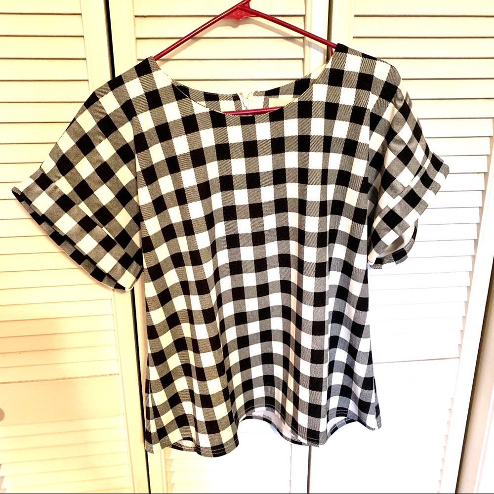 Boxy black and white checked blouse